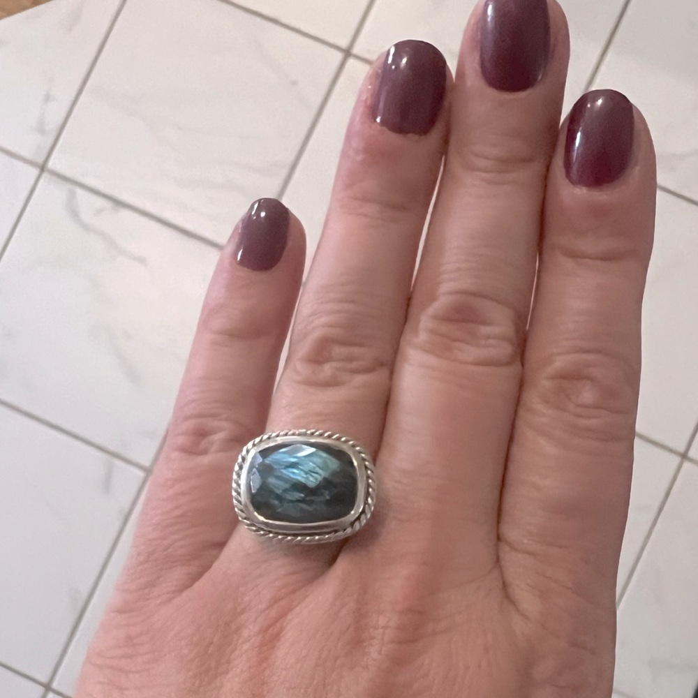 Designer sterling silver size 8 ring with blue stone